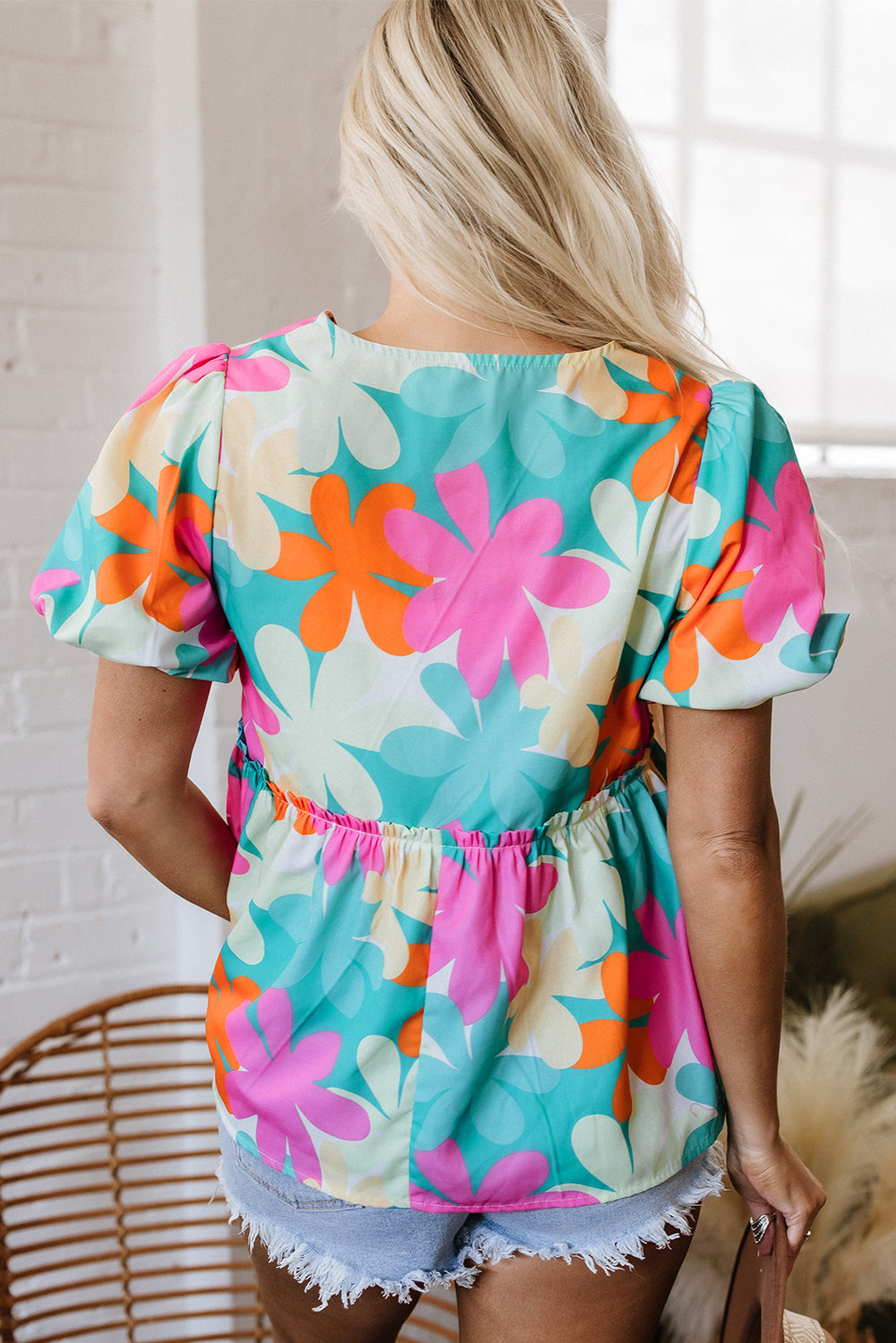 Rayne Floral V Neck Peplum Blouse